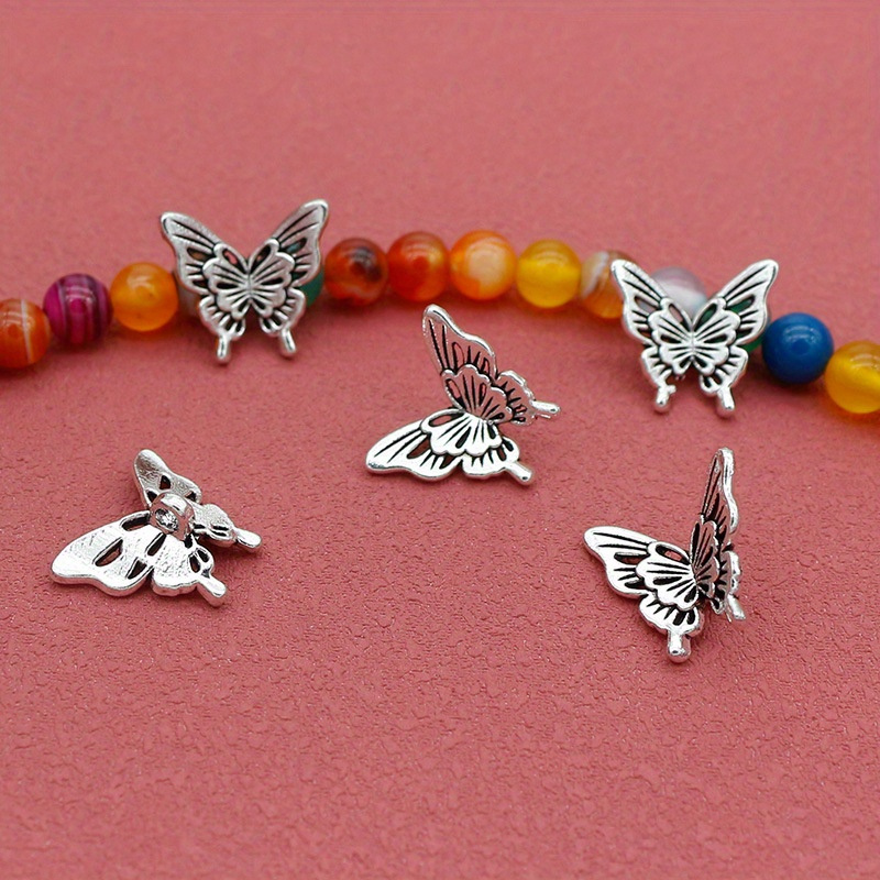 10PCS Silver Butterfly Accesso - مراجعة Butterfly Pendant Necklace وسعره