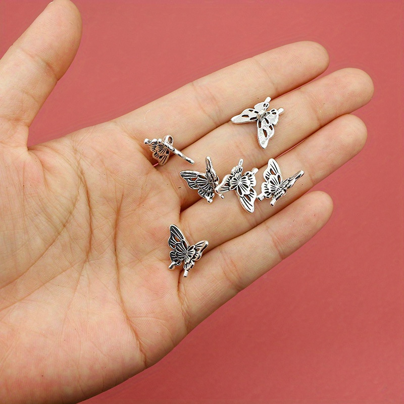 10PCS Silver Butterfly Accesso - مراجعة Butterfly Pendant Necklace وسعره